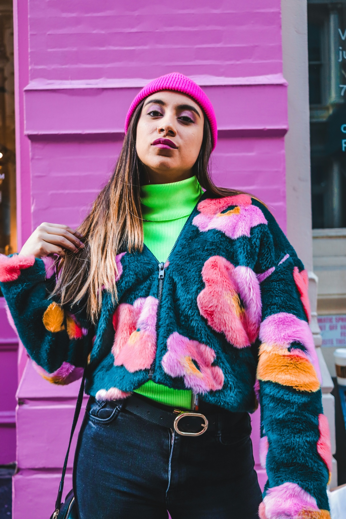 Unsplash: Woman in stylish loud outfit by laura d vargas