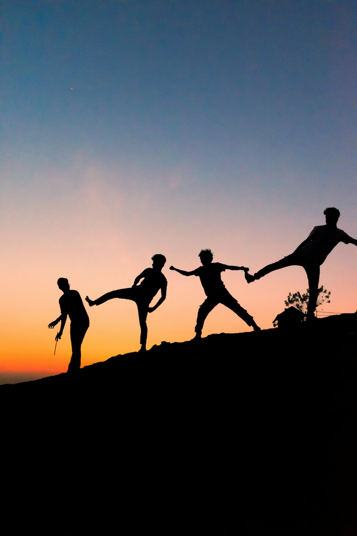 Unsplash: Friends silhouettes against sunset by sreehari A P
