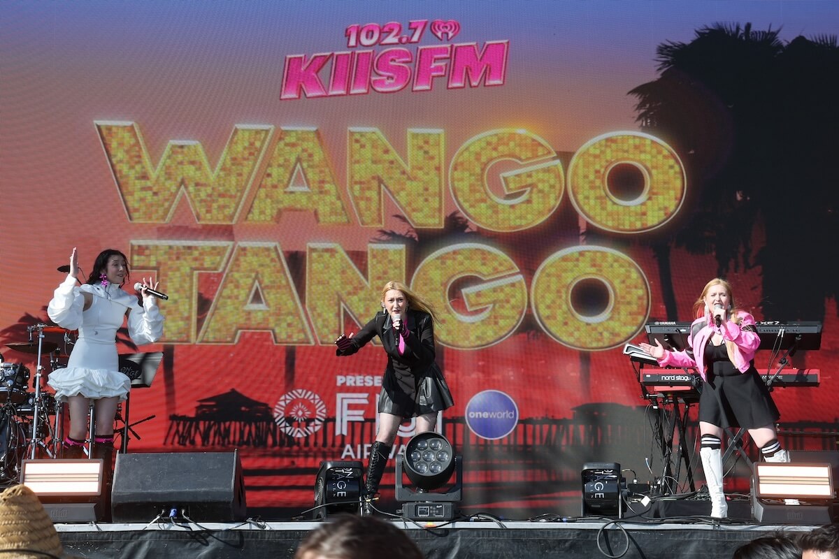 Shutterstock: HUNTINGTON BEACH, CALIFORNIA - MAY 10: (FOR EDITORIAL USE ONLY) (L-R) Bella Heichel, Madi Heichel and Ana Heichel of Sorellé perform onstage during iHeartRadio's 102.7 KIIS FM Wango Tango in Huntington Beach, California on May 10, 2025. (Photo by Phillip Faraone/Getty Images for iHeartRadio)