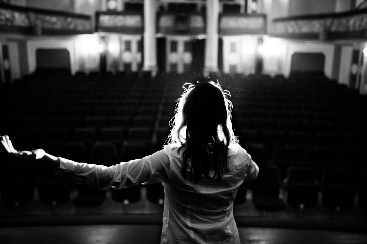 woman acting on stage