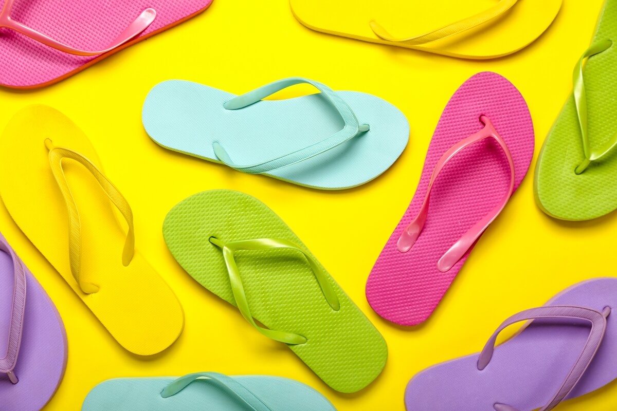 assortment of colorful flip flops