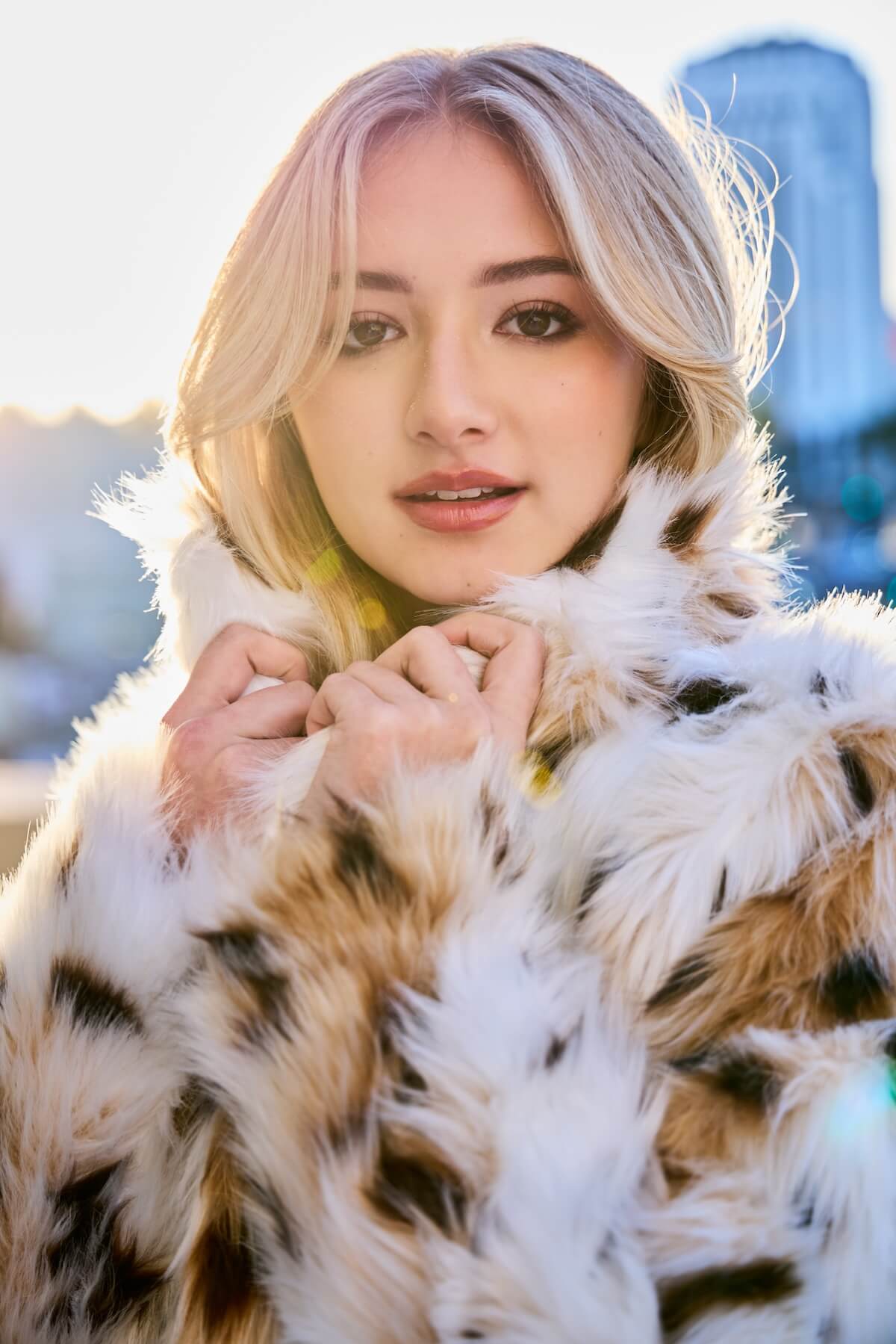 Lacey Katena acting promo image in a furry coat