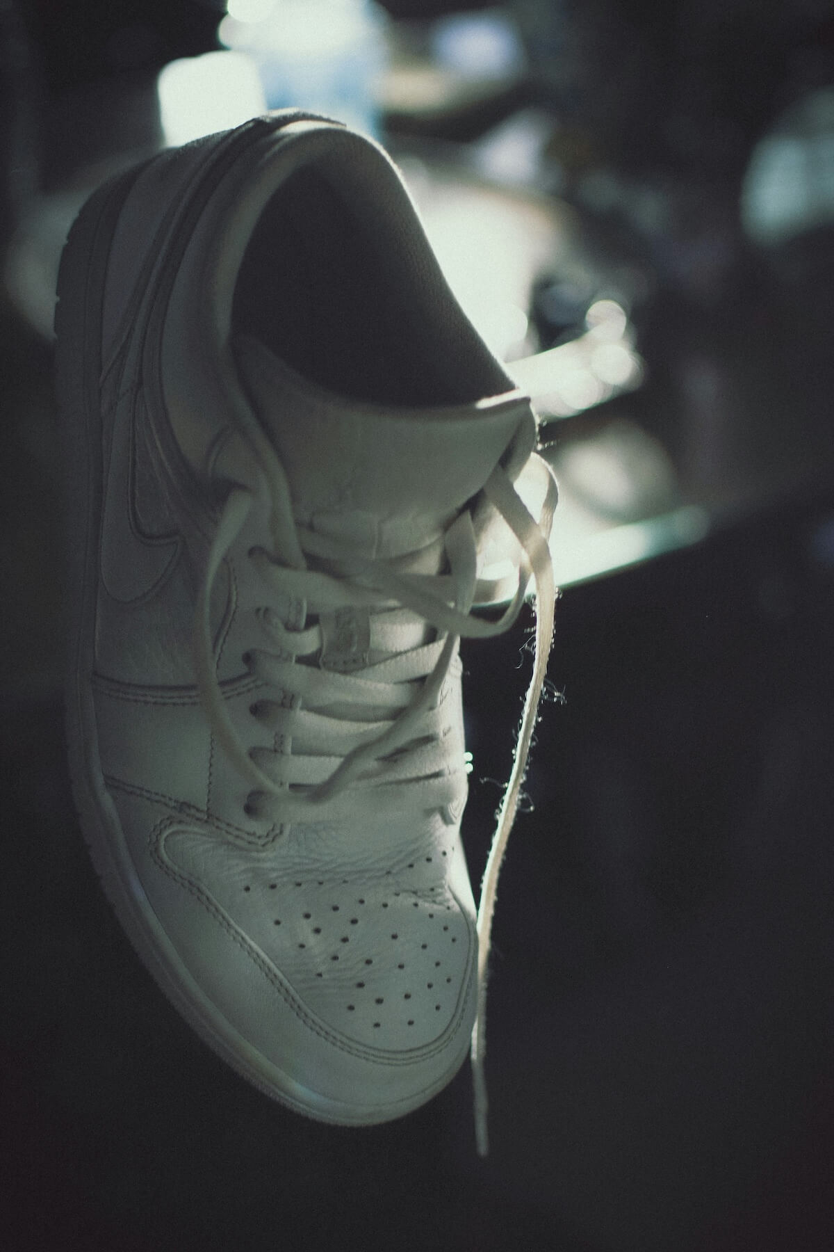 Unsplash: White dad sneaker by Pouria Oskuie