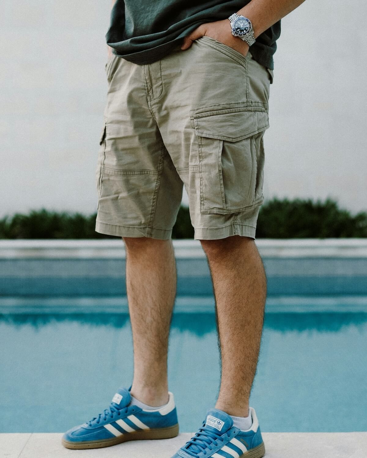 Unsplash: Man wearing cargo shorts by Nikola