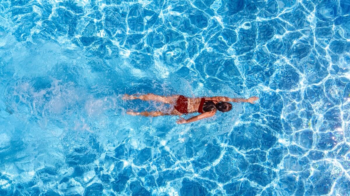 woman swimming laps
