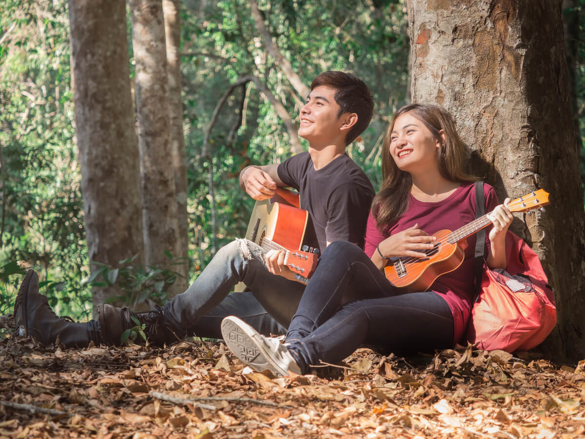 young people playing guitar