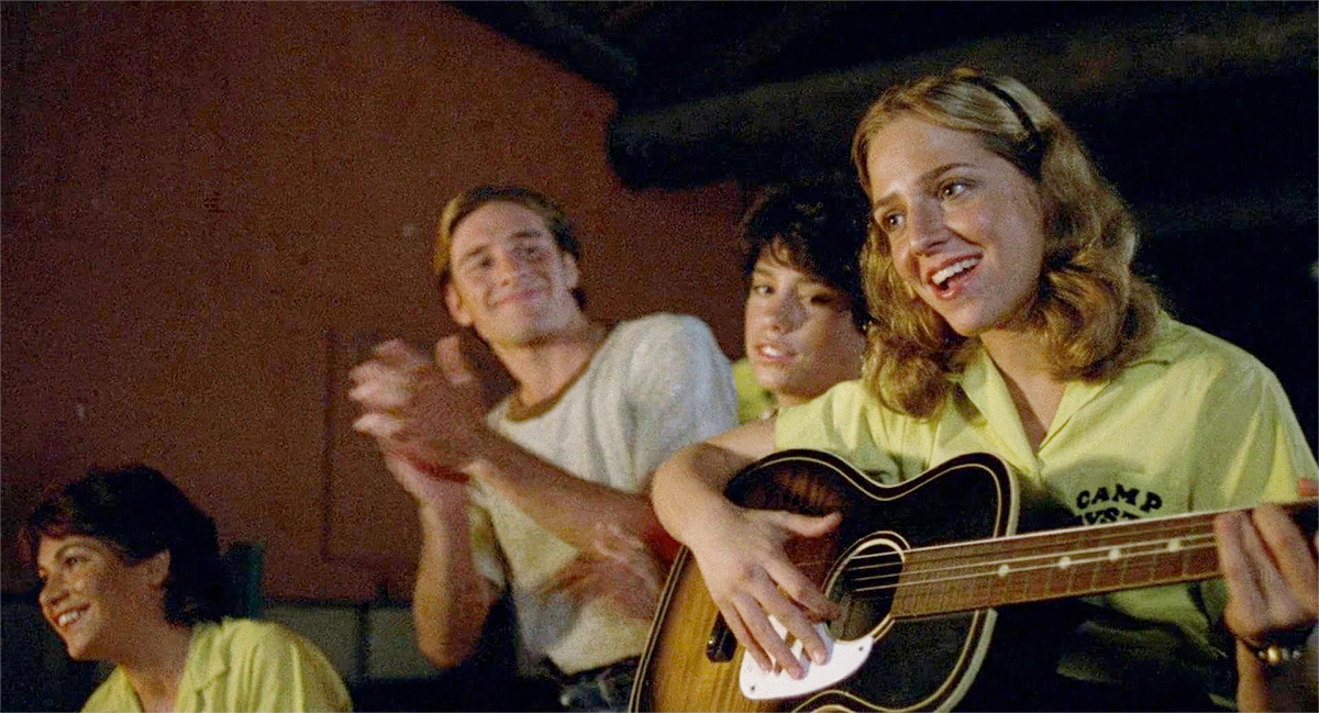 Friday the 13th 1980: singing around campfire