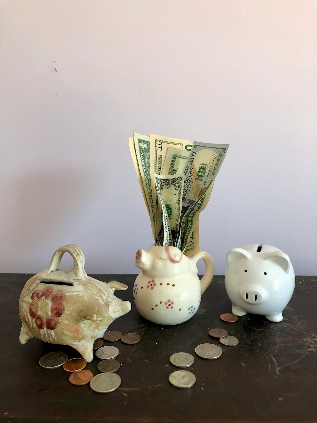 Unsplash: Collecting money in piggy banks by Diana Helentjaris