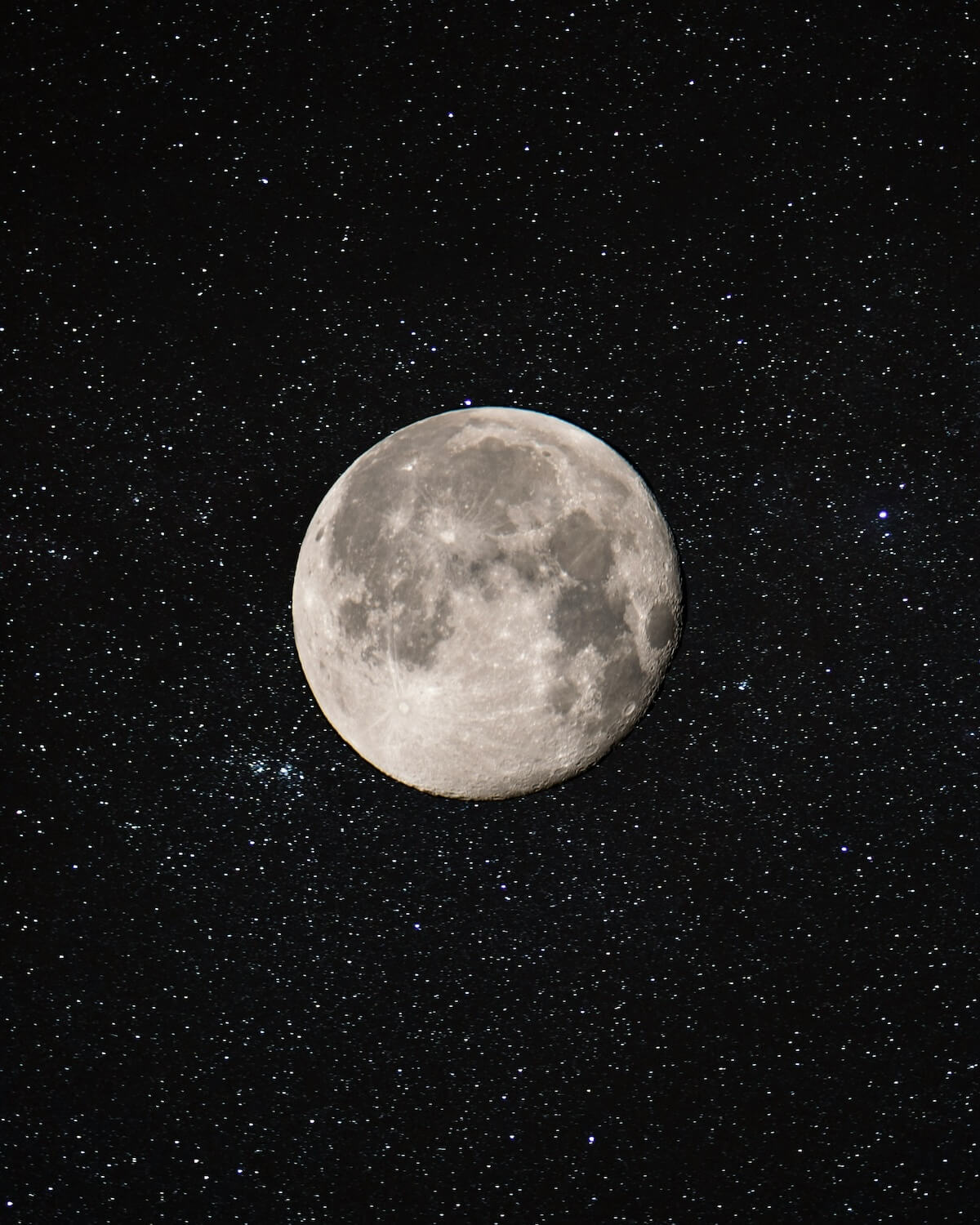 Unsplash: Full Moon against starry sky by Josh Miller