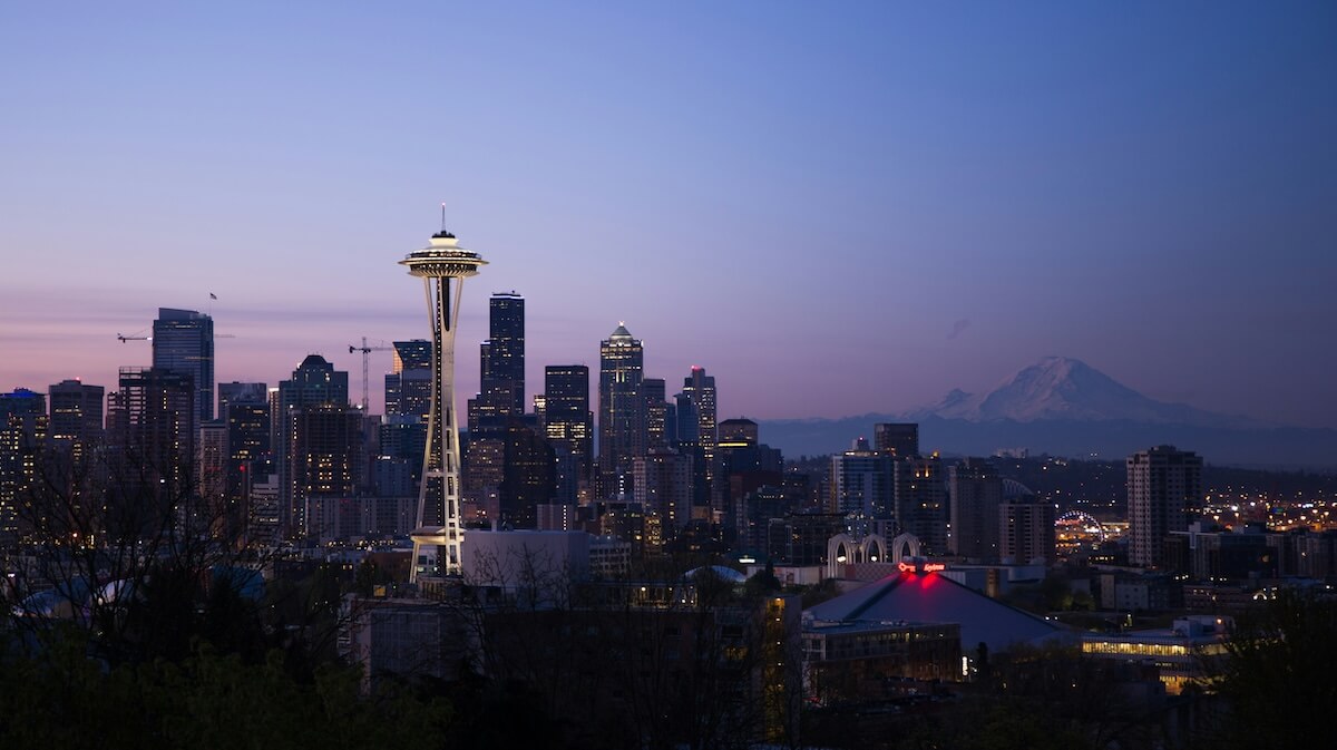 Unsplash: Space needle and mt. rainier by Zhifei Zhou