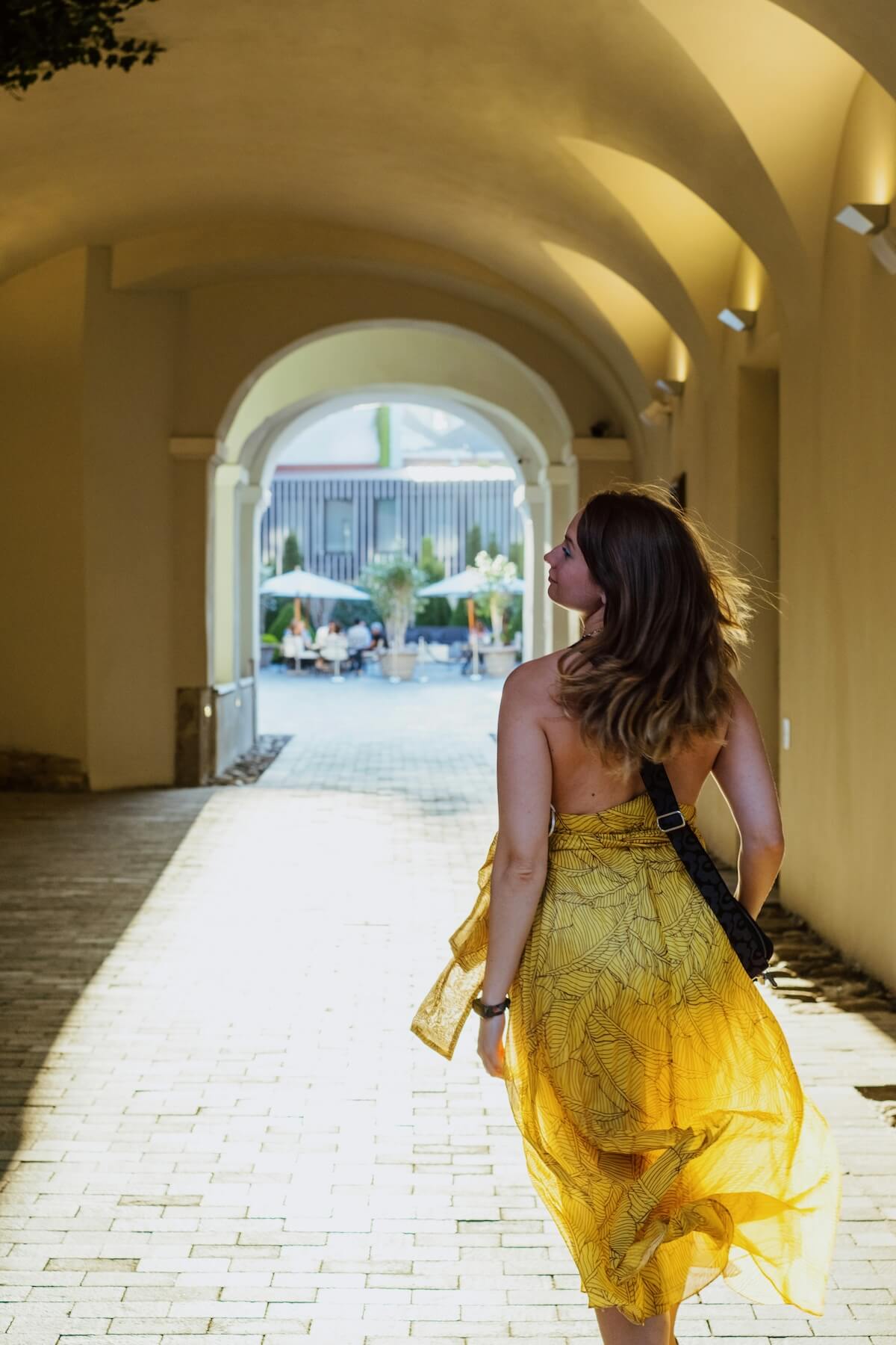 Unsplash: Woman in banana yellow dress by Mikki Luotio