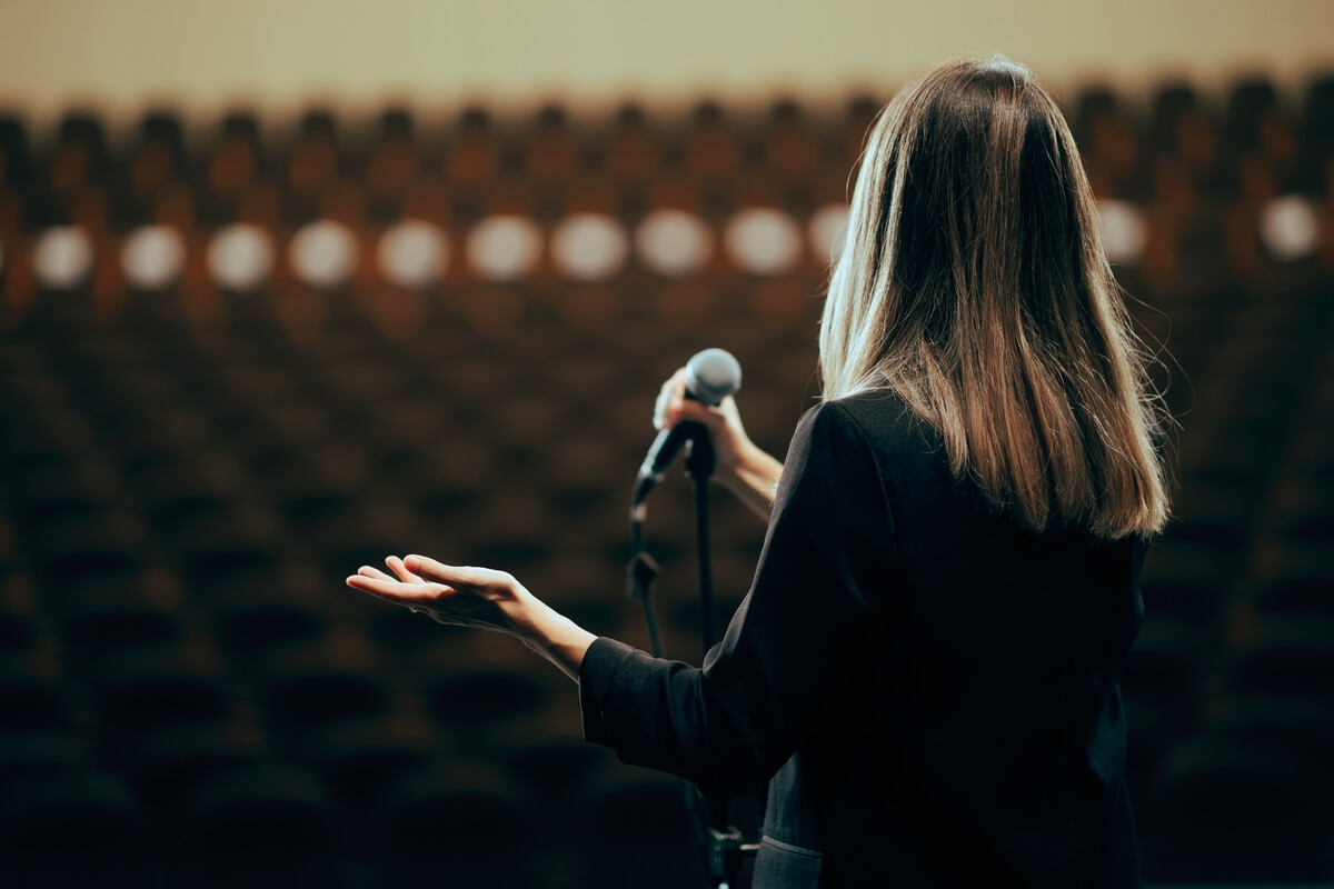 woman talking to an audience