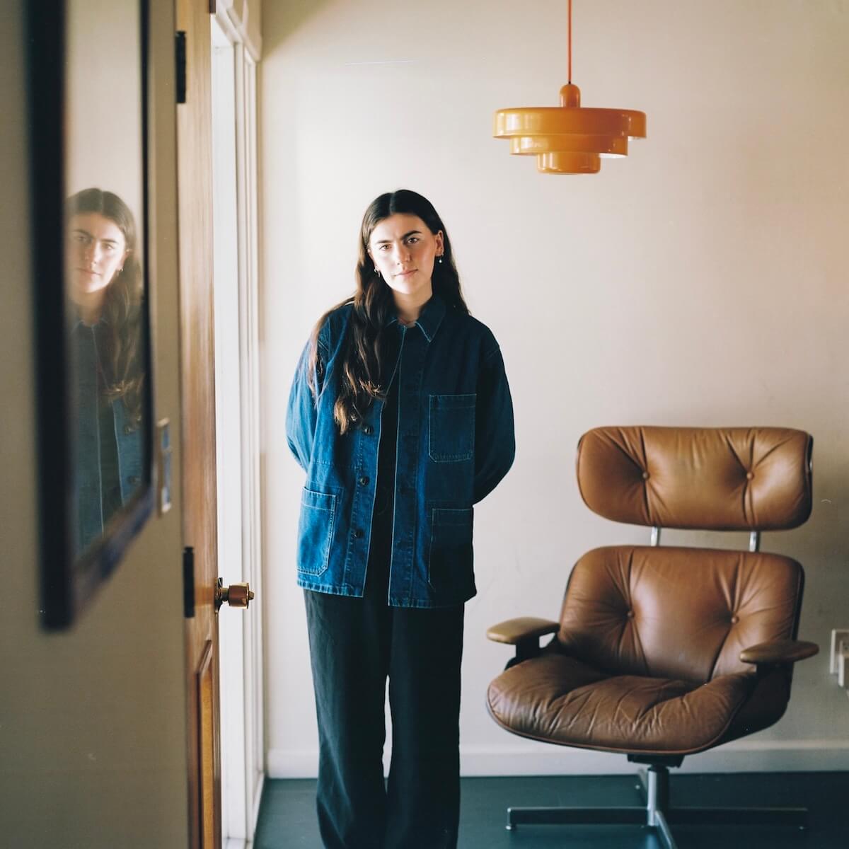 Avery Lynch Glad We Met promo image by chair