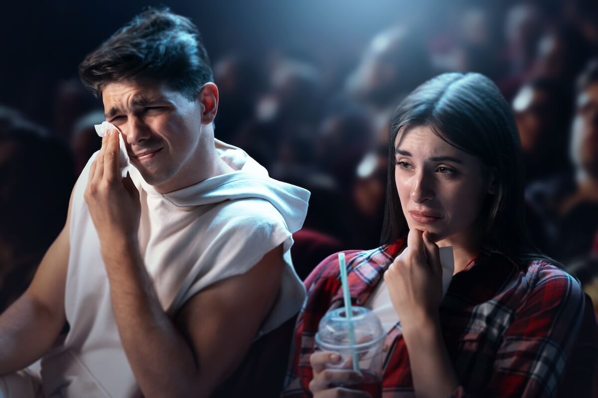 Shutterstock: Young man and woman visiting cinema, watching sad movie, drama film. Sitting and crying. Sad moment. Concept of leisure time, relationship, emotions, weekend activity