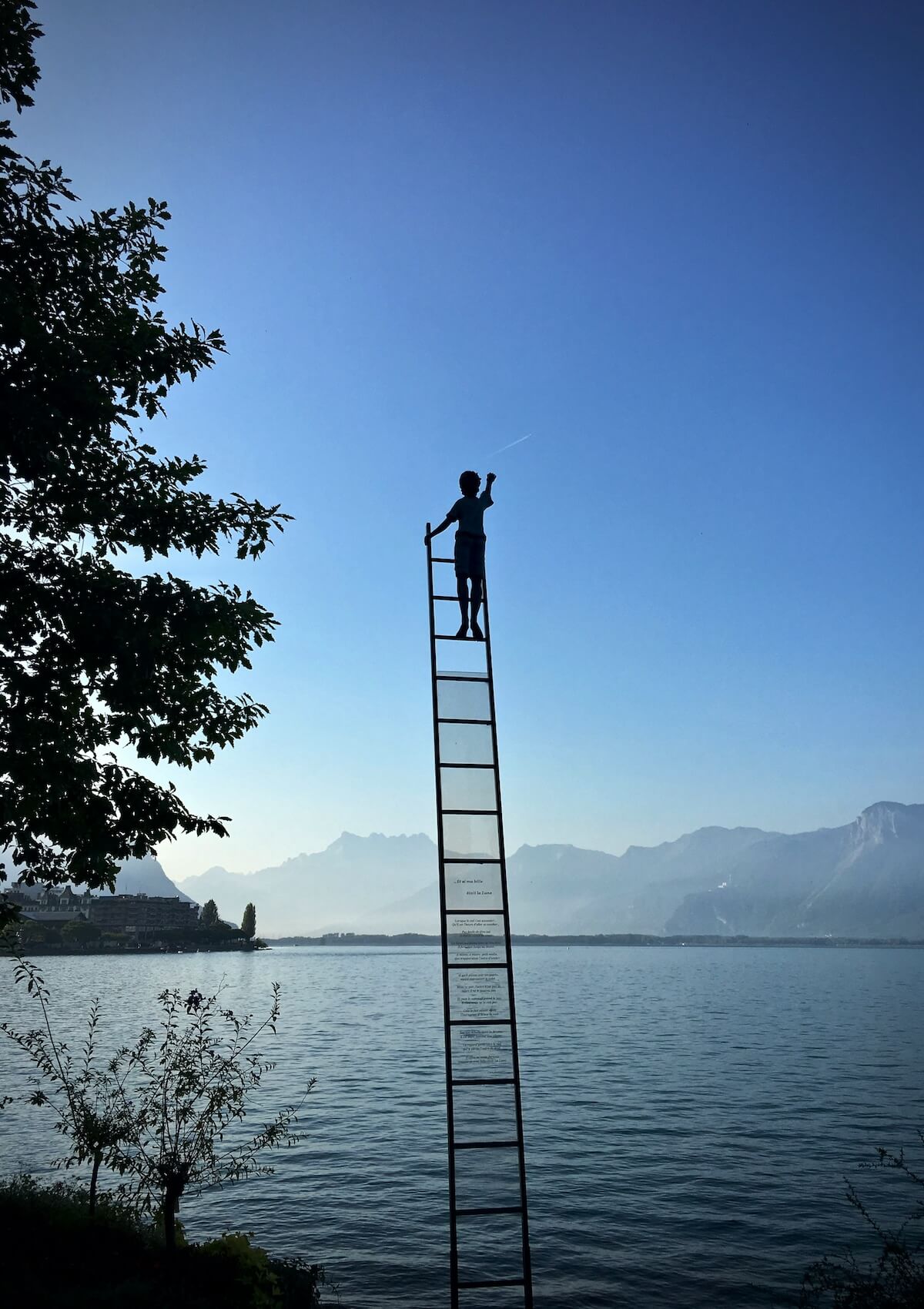 Unsplash: Ambitious ladder climber by Armand Khoury