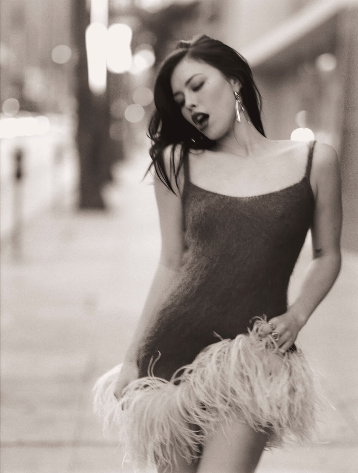 Cynthia Parker Love Song promo image with feather dress