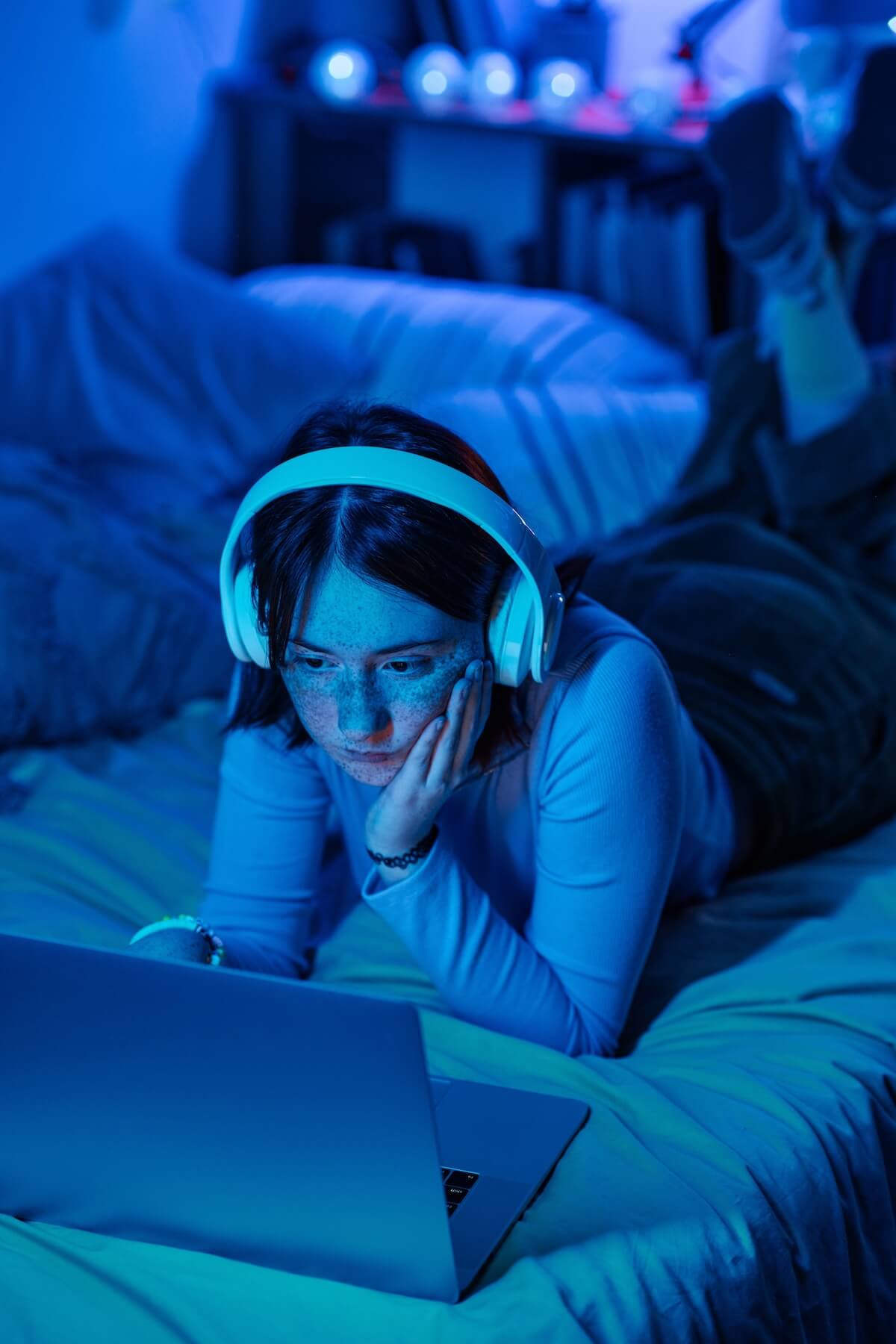 Shutterstock: Girl playing computer game at night