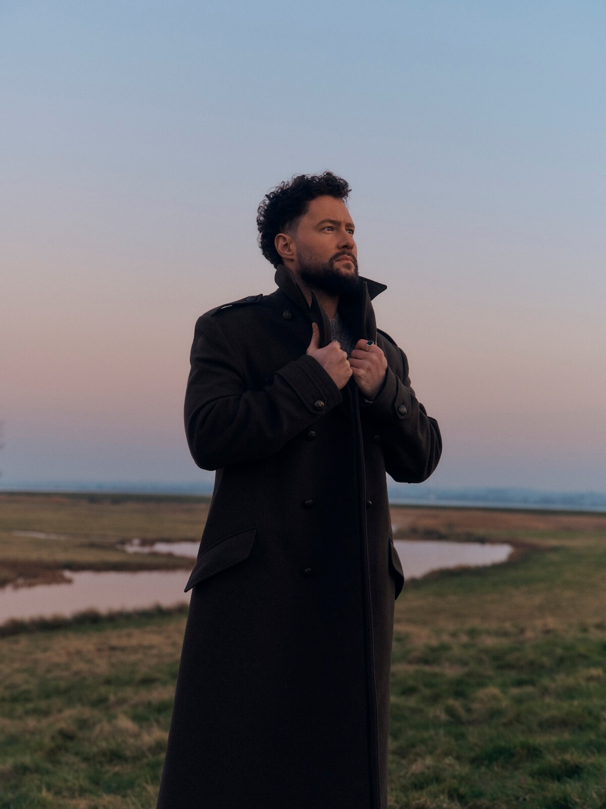 Calum Scott Avenoir press image in coat